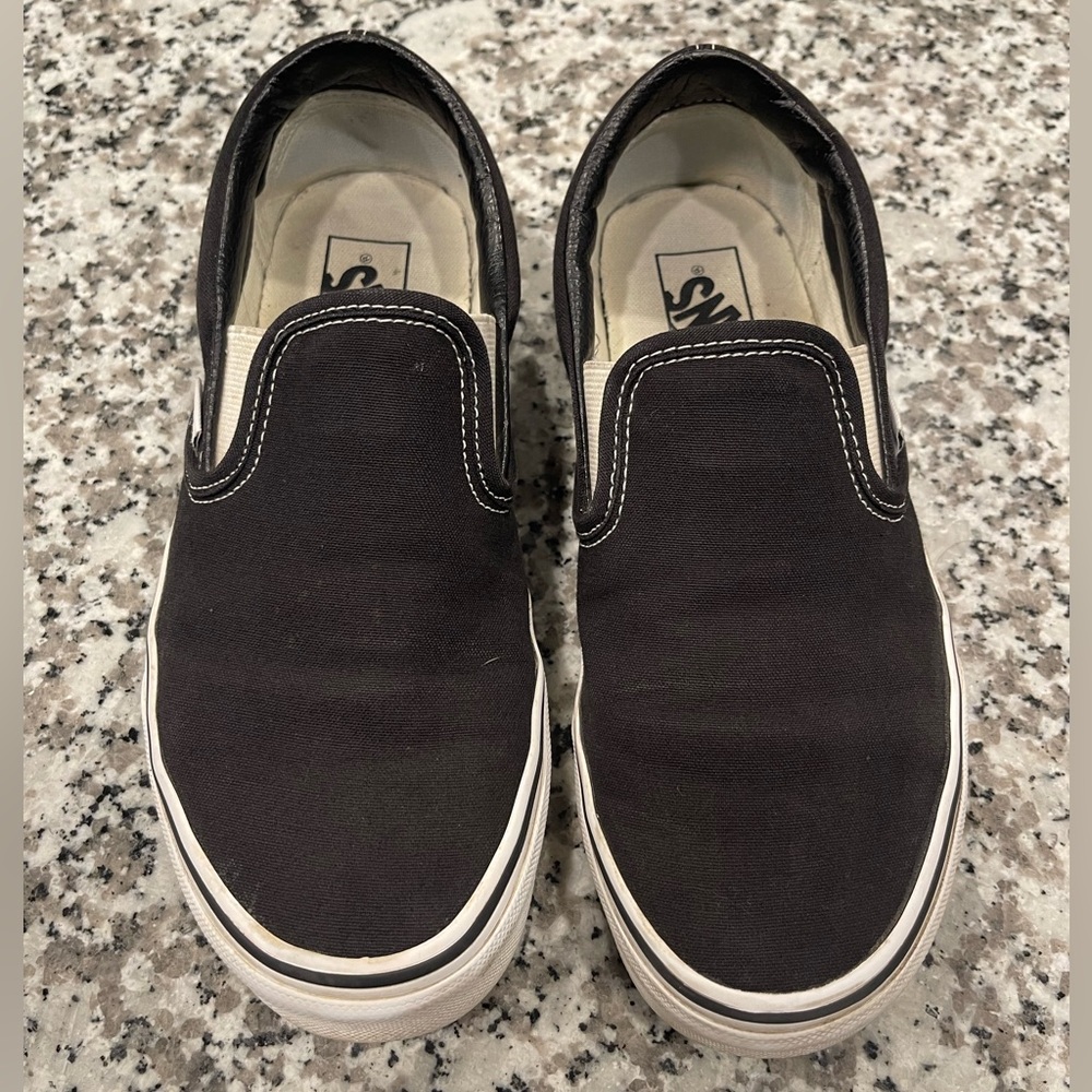 Classic Slip-on Vans in Black, Size 8.